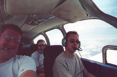 Bonanza cabin: Is three
pilots in one plane worth only 1/2 a student pilot?